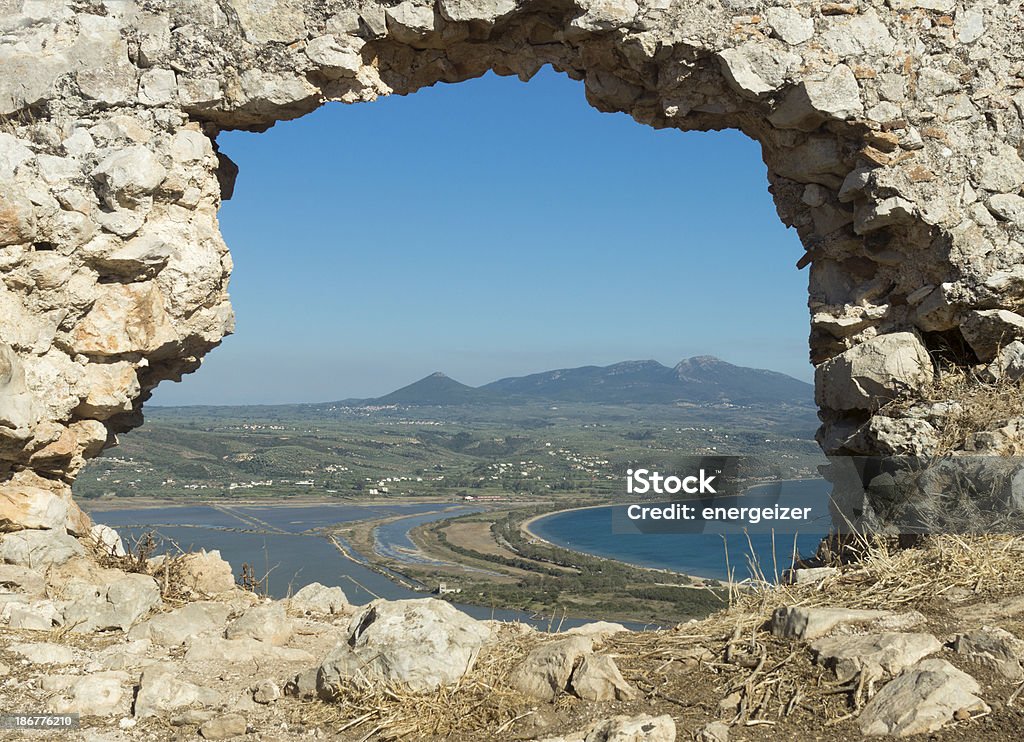 Lagoon of Divari (Gialova) view Lagoon of Divari (Gialova) in Messinia prefecture through Old Navarino castle ruins Beauty In Nature Stock Photo