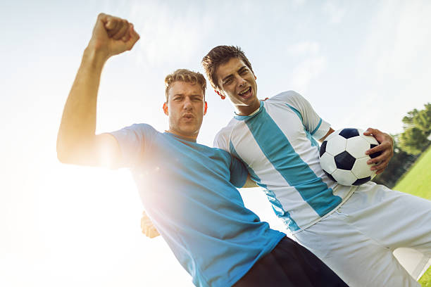 istock Soccer players together 186776320