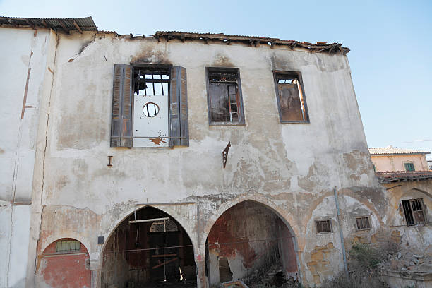 istock building facade with crumbled burnt out  windows Nicosia  Cyprus 186778602