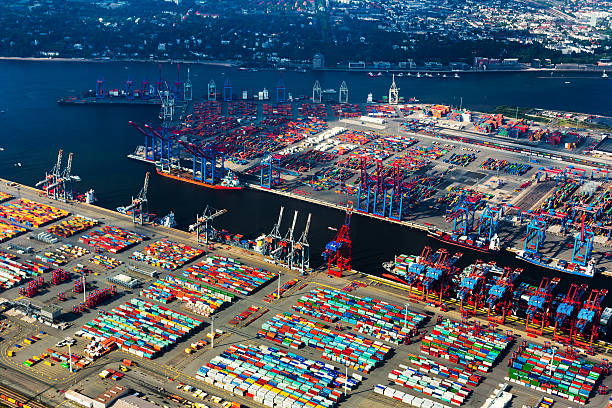 Aerial view over Hamburg with s lot of industrie at the Elbe river.