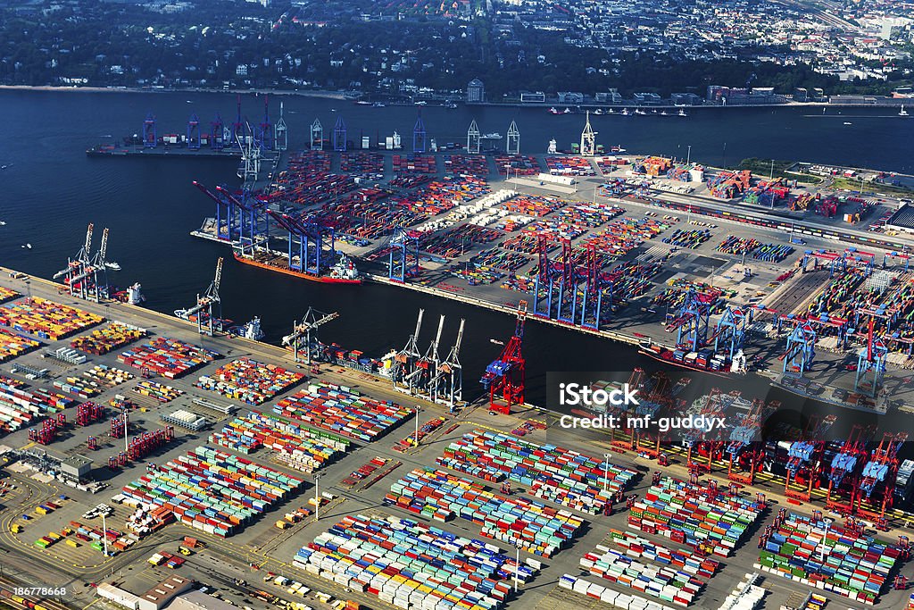 Aerial view of Hamburg Harbour, Cargo Terminal Aerial view over Hamburg with s lot of industrie at the Elbe river. Hamburg - Germany Stock Photo