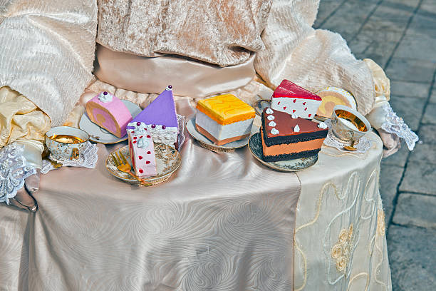 Female mask with cakes in Venice.