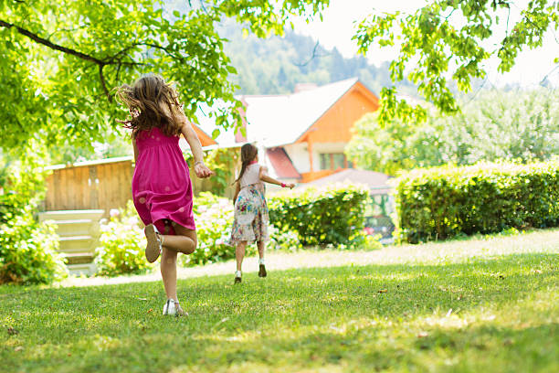 istock children having fun outdoors 186780261