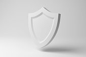 White shield floating in mid air on white background in monochrome and minimalism. Illustration of the concept of physical and digital guarding, protection and security