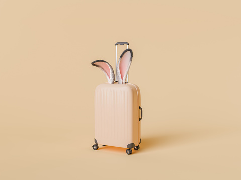 3D rendering of a peach-colored travel suitcase with whimsical bunny ears sticking out, set against a soft pastel yellow background.