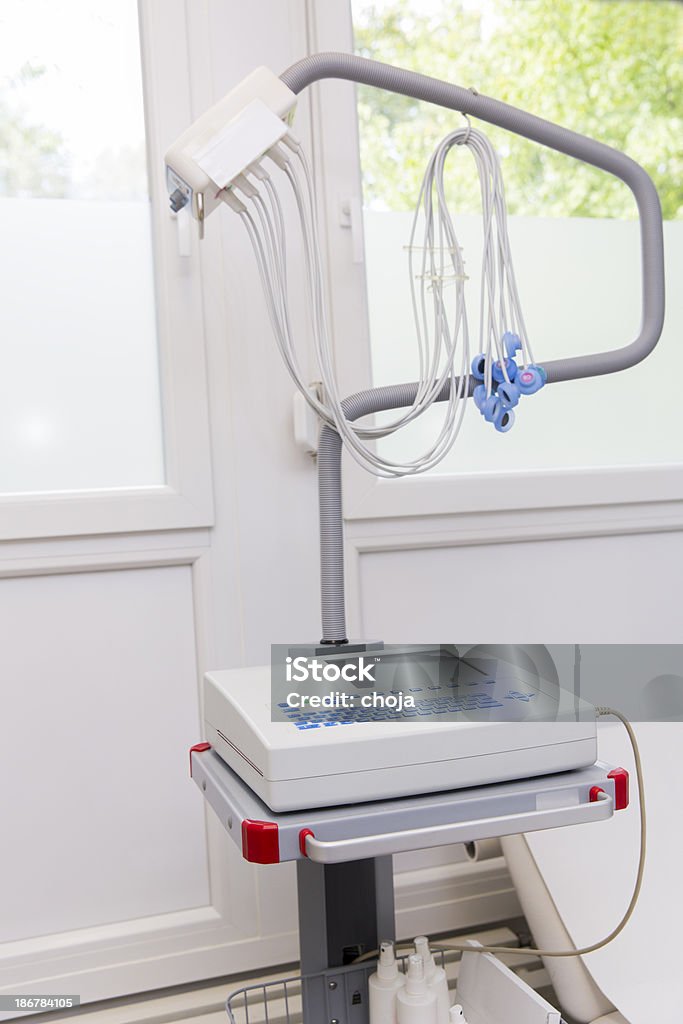 Modern portable ECG device on a crash cart Modern portable ECG device on a crash cart...with electrodes hanging Crash Cart Stock Photo