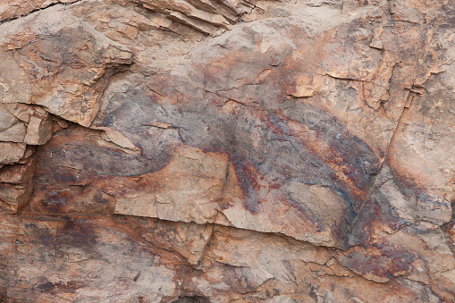 Snake-shaped reddish stain of Chiquita Rock. Villuercas geopark. Canamero, Caceres, Extremadura, Spain