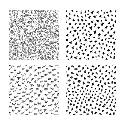 Hand drawn ink abstract seamless textures. Set of four seamless textures with scribbles, circles, stars and curved lines. Modern trendy background or illustration.