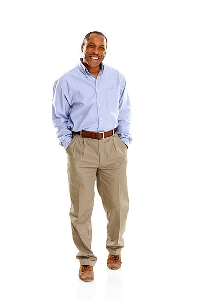 istock Smiling african businessman standing casually on white 186788781