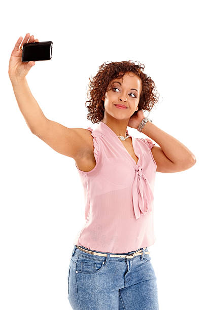 istock Attractive young woman taking self portrait 186789541