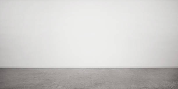 istock 3d rendering of interior. Blank white wall and concrete floor. Contemporary design. Textured background. 1867913698
