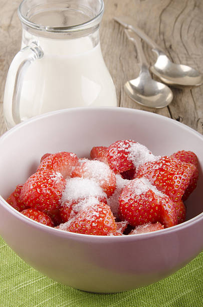 istock strawberries with sugar in a bowl 186791635