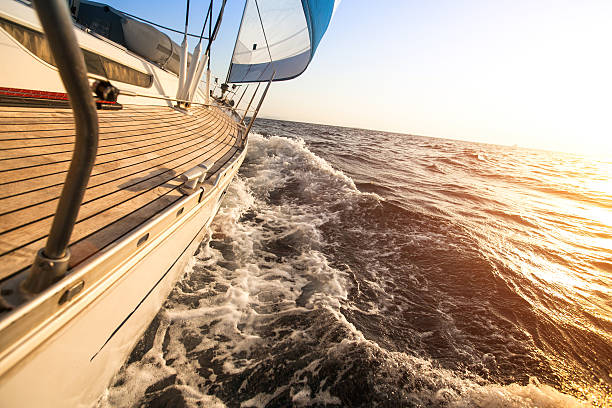 istock Yacht sailing towards the sunset. Luxury yachts. 186792001