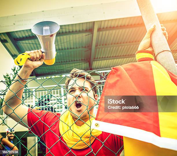 Angry Team Supporter By The Fence Of A Stadium Stock Photo - Download Image Now - Adult, Anger, Atmosphere