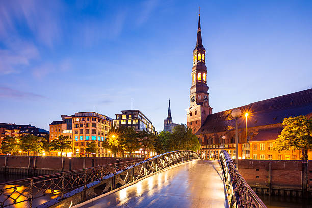 Beautiful Hamburg Speicherstadt in the evening with the St. Katharinen.