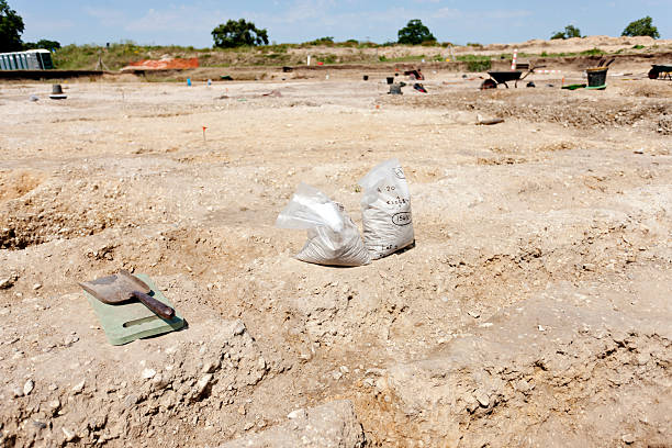 Archaeological dig An archaeological dig. Silchester, Hampshire, UK.  kneelers stock pictures, royalty-free photos & images