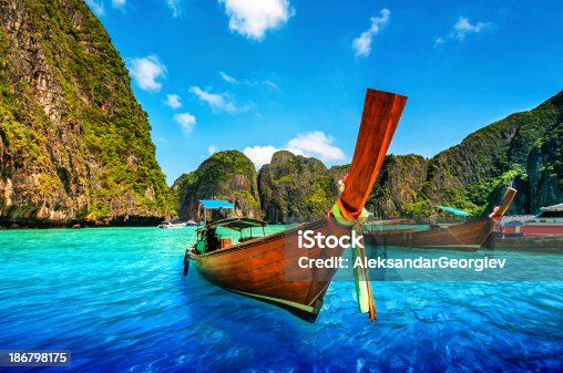 istock A Longtail Wooden Boat at Maya Bay, Thailand 186798175