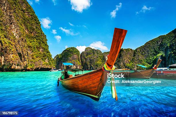 A Longtail Wooden Boat At Maya Bay Thailand Stock Photo - Download Image Now - Phuket Province, Thailand, Phi Phi Islands