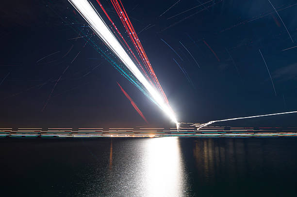 Light trails of Airplanes stock photo