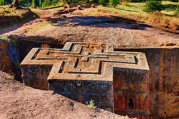 Bete Giyorgis - Church of Saint George, Lalibela Church of Saint George is the most well known and last built of the eleven churches in the Lalibela area. Bete Giyorgis is carved from solid red volcanic rock in the 12th century,http://bem.2be.pl/IS/ethiopia_380.jpg ancient ethiopia stock pictures, royalty-free photos & images