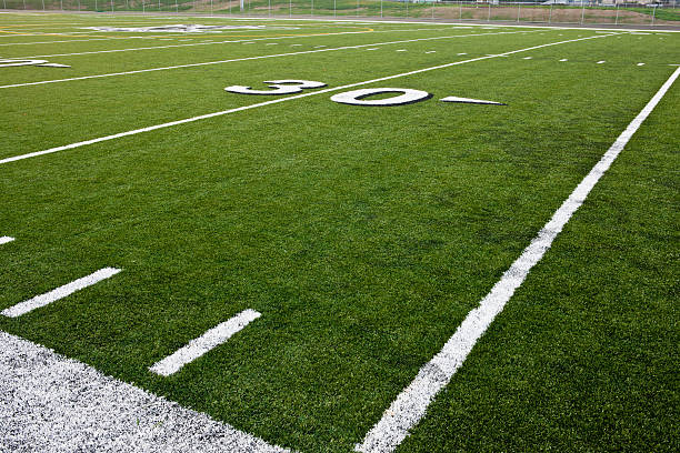 istock Thirty Yard Line on Football Field 186798511