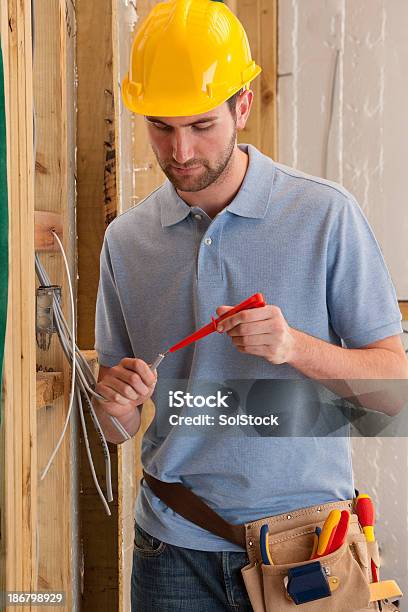 Electrician Working Stock Photo - Download Image Now - 20-29 Years, Adult, Adults Only