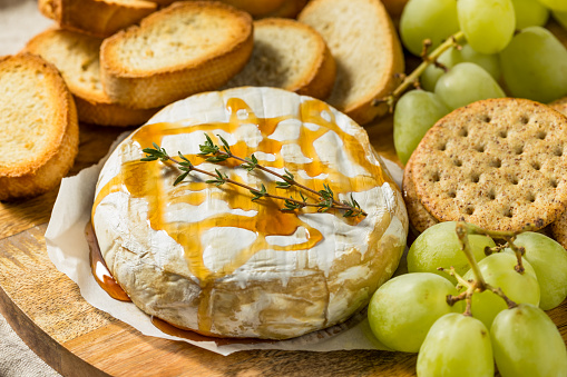 Homemade Baked Brie Appetizer with Grapes and Crackers