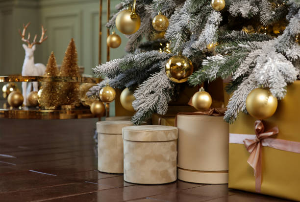 istock Many gift boxes under decorated Christmas tree at home, closeup 1867992580