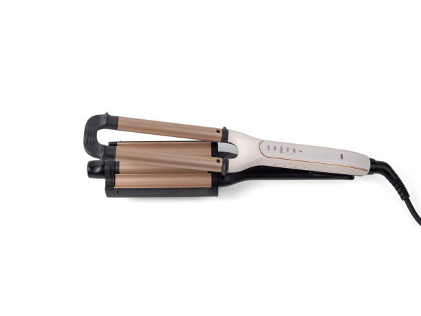 istock Electric hair curling iron. 1868010882