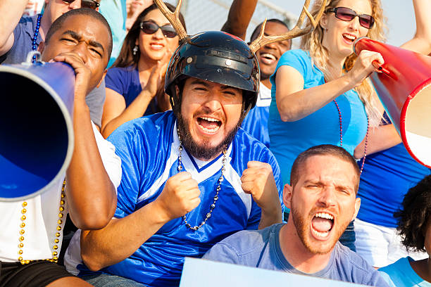 istock Sports: Fans cheer for their team during local sporting event. 186801547