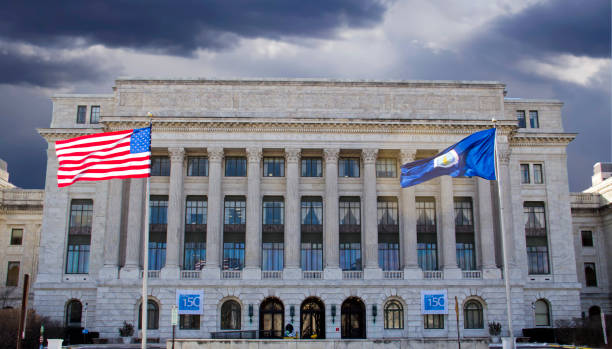 department of agriculture office building, american flag flapping, in washington dc, united states - us department of agriculture stock-fotos und bilder