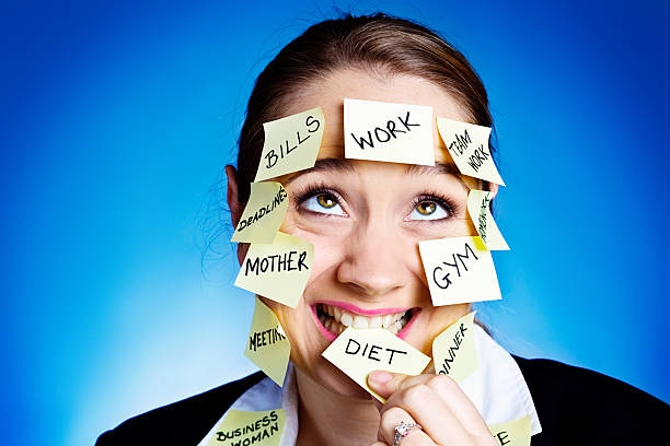 istock Zany woman covered in  task reminders nibbles Diet reminder 186803213