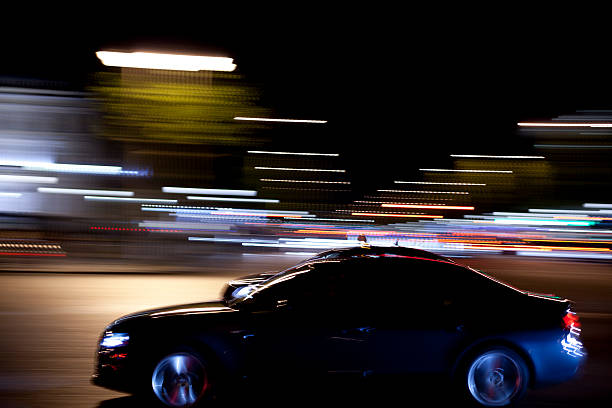 istock Paris traffic with panning motion at night 186804666
