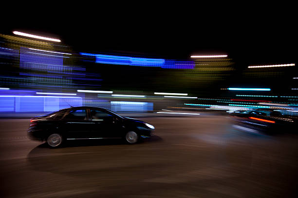 istock Paris traffic with panning motion at night 186804681