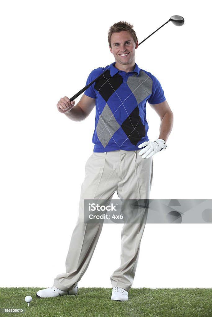 Ritratto di un giocatore di golf - Foto stock royalty-free di Abbigliamento casual