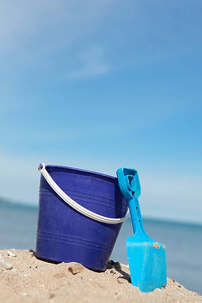 istock Pail and Shovel at the Beach 186805439