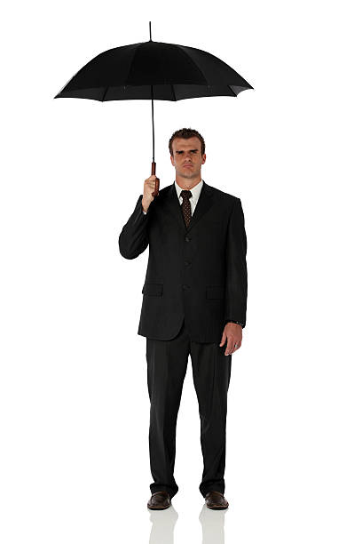 istock Businessman under an umbrella 186805839