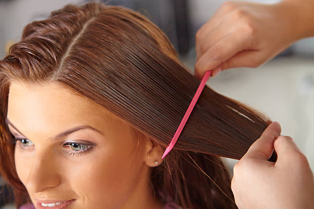 istock Hair salon. Women`s haircut. Combing, 186805982