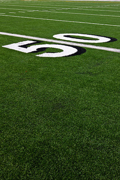 istock Fifty Yard Line on Football Field 186806001