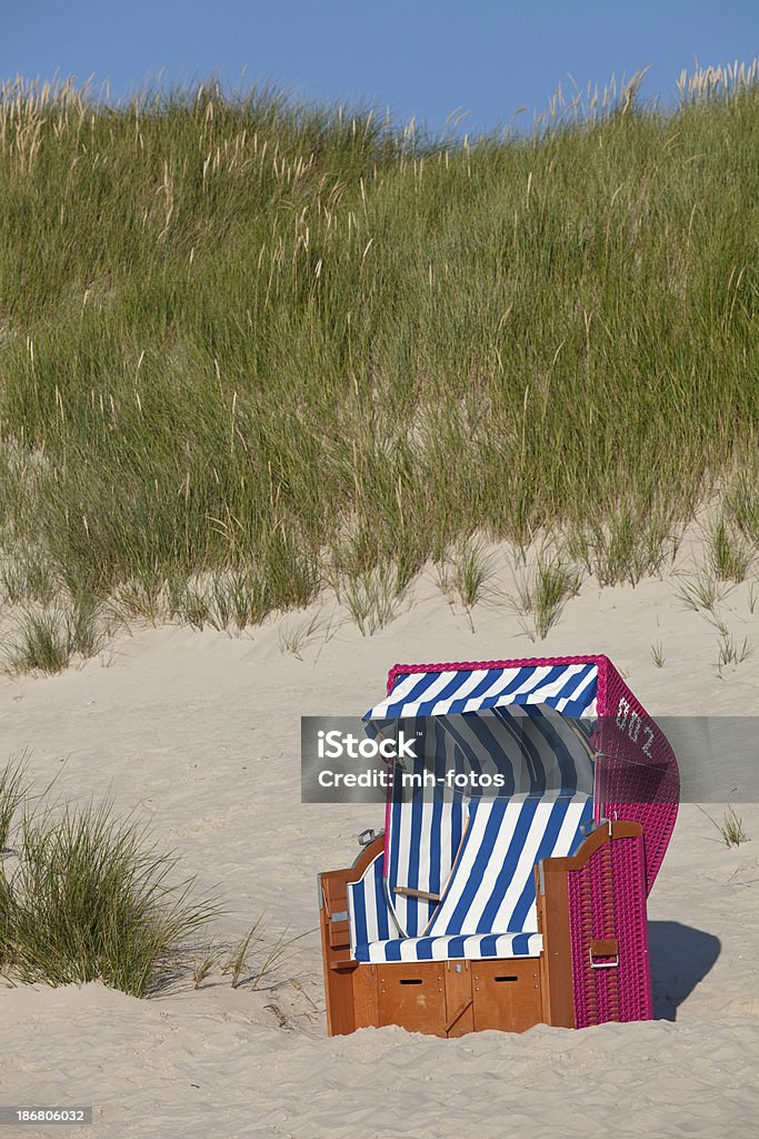 nice place on the beach beach-chair in front of a dune at Amrum - GermanyYou can see more AMRUM  images in my lightbox: I Love AMRUM Hooded Beach Chair Stock Photo