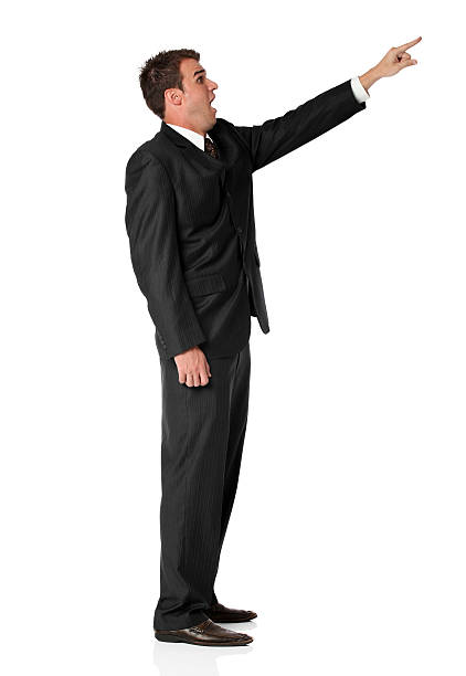 istock Businessman pointing with his finger and looking surprised 186806558