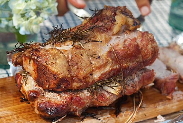 istock Roast Pork with garlic and rosemary 186806574