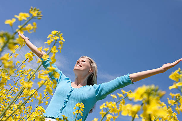 istock Pretty young woman with arms raised 186806613