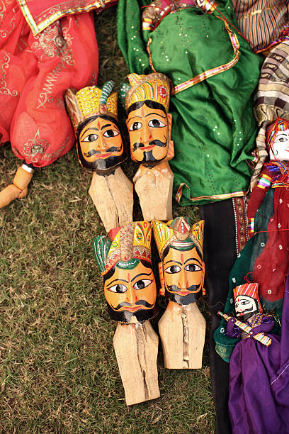 Indian Folk Dolls Indian puppet dolls in the outdoor market in Agra. doll puppet indian culture small stock pictures, royalty-free photos & images