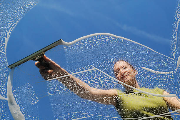 istock Female domestic Window Cleaner washing 186807635