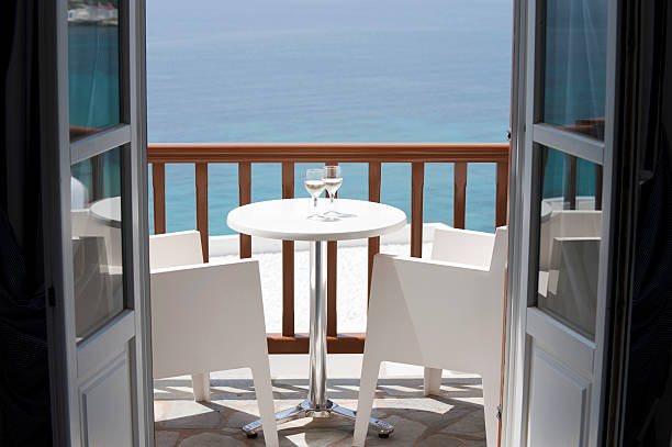 istock Two glasses of wine on a balcony 186807666
