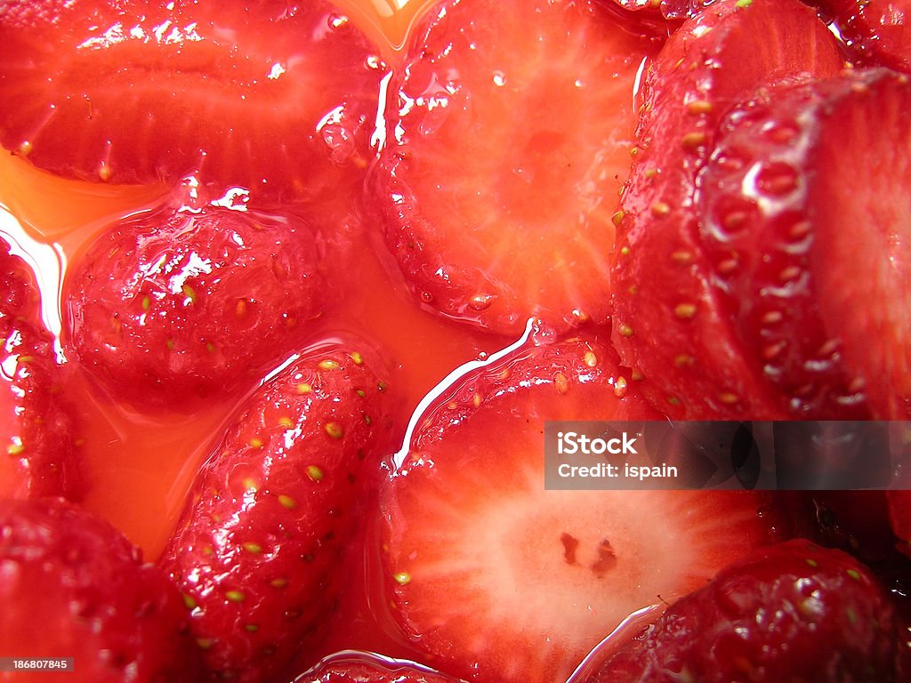 Strawberries Macerated - Close-up (2) Strawberries macerated with lime juice. A tastefully full of colour acid & sweet combination.<br><br>Natural Light - No Flash<br><br><a href='http://www.istockphoto.com/file_search.phpaction=file&userID=147849'><img src='http://www.istockphoto.com/images/port_but_green_168-22.gif' border='0' alt='View My Portfolio'></a> Fruit Stock Photo