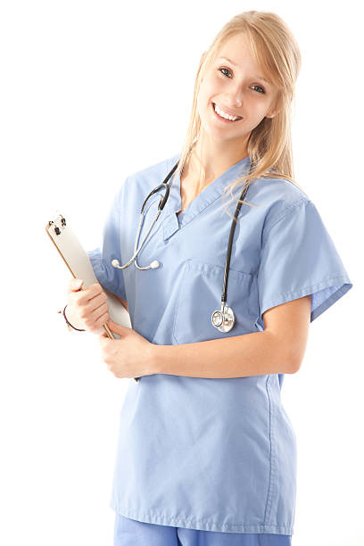 istock Happy Young Nurse with Clipboard and Stethoscope 186808035