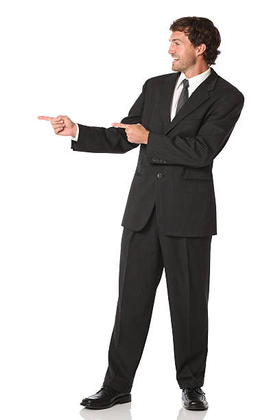 istock Slick businessman double pointing off camera 186808145