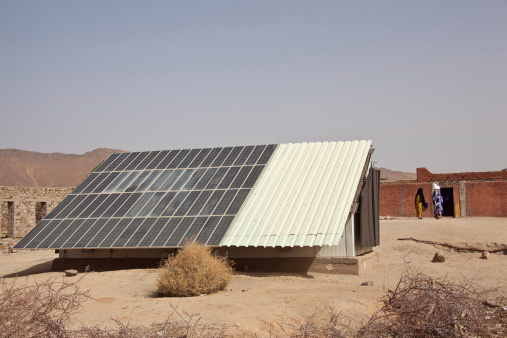 Solar panel in a Tuareg village southern Algeria. Solar energy is the only possibility for the people far away from towns to get electric light.